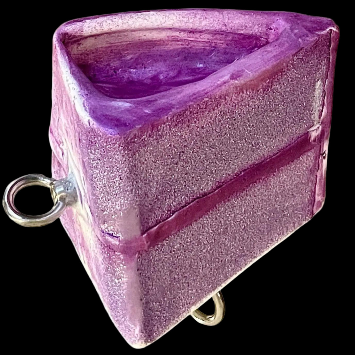 purple "Piece of Cake" armlifting implement / grip strength training tool. Triangular prism with recessed crimp round. Loading eyelets on 2 faces.
